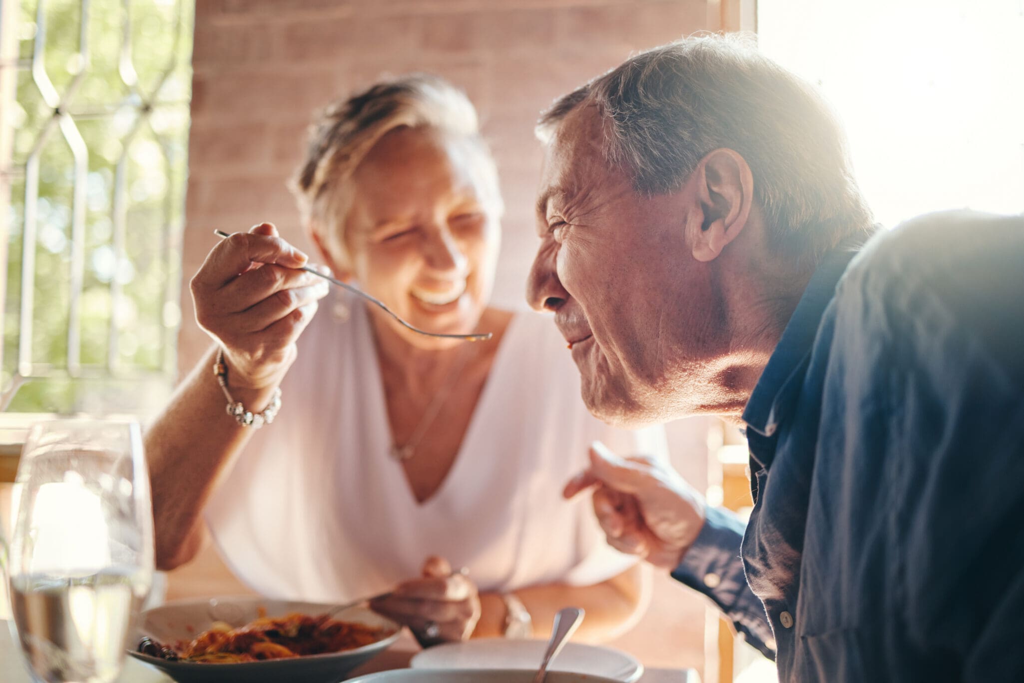 Couple enjoying their daily serving of the best fiber for seniors.